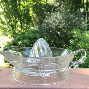 Vintage clear glass hand juicer
